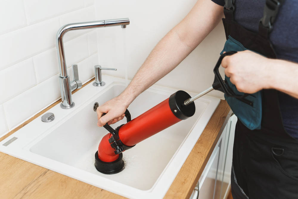 plumber unclogging kitchen drain Chesterfield, VA plumber unclogging kitchen drain Chesterfield, VA